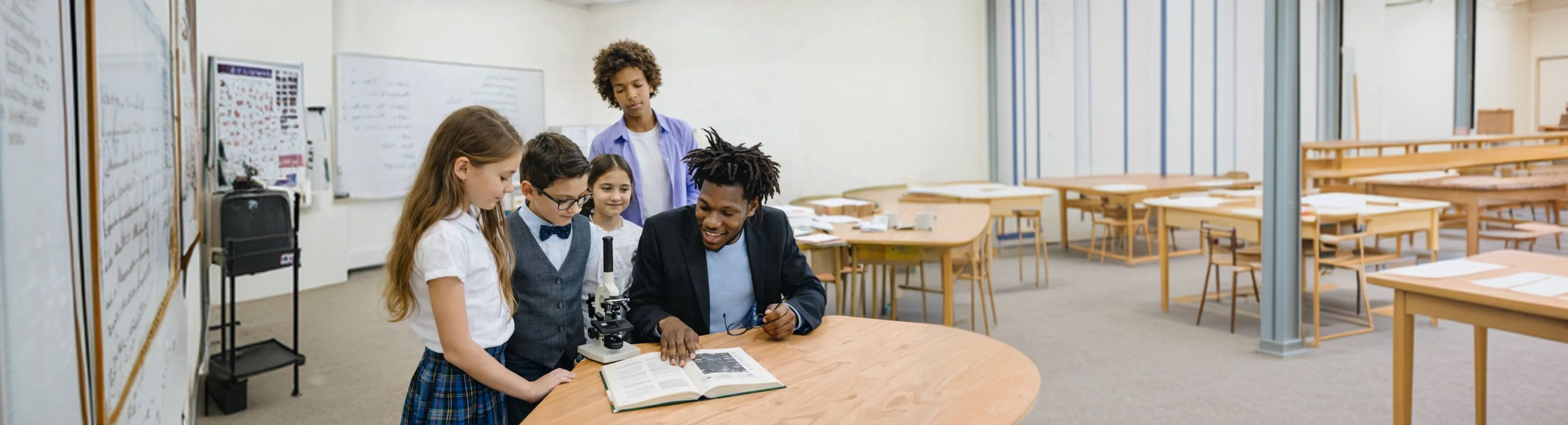 Children writing and working on projects in a classroom setting.